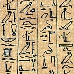 Egyptian hieroglyphics on a papyrus scroll